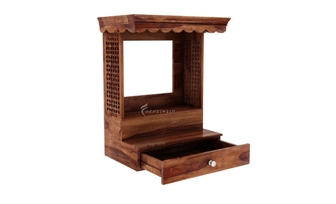 Aaradhya wooden mandir shown on a wall with an idol.