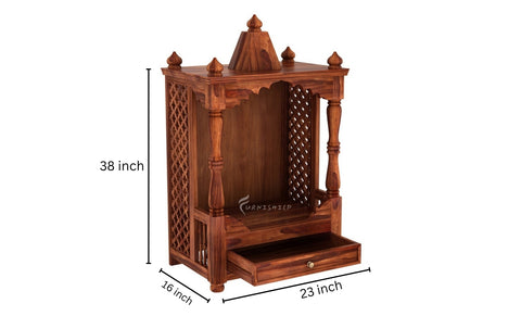 Close-up of the intricate jaali carving on the Divya pooja mandir