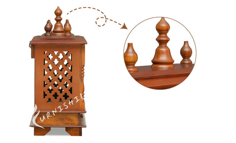 Close-up of the jaali doors and storage drawers on the Chavi mandir.