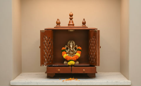 Chavi compact pooja mandir with doors closed, front view.